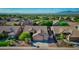 Aerial view showcasing a house in a neighborhood with distant mountain views at 1731 W Cathedral Rock Dr, Phoenix, AZ 85045