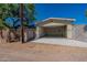 Open garage door revealing a spacious interior at 4649 N 74Th Pl, Scottsdale, AZ 85251