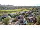 Aerial view of a luxury home with pool near a golf course at 10015 N 55Th St, Paradise Valley, AZ 85253