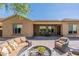 Inviting backyard with a fire pit and comfortable seating at 28110 N 18Th Ln, Phoenix, AZ 85085