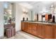 Bathroom with double vanity and granite countertop at 6711 E Camelback Rd # 3, Scottsdale, AZ 85251