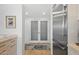 Modern kitchen with stainless steel refrigerator and frosted glass doors at 7127 E Rancho Vista Dr # 6011, Scottsdale, AZ 85251