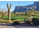 Golf course with saguaro cactus and mountain backdrop at 2744 S First Water Ln, Gold Canyon, AZ 85118