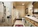 Bathroom with a shower, soaking tub and double vanity at 18651 N 101St Pl, Scottsdale, AZ 85255