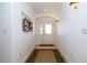 Bright entryway with tiled flooring and a built-in shelf at 8183 W Raven Dr, Arizona City, AZ 85123