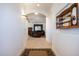 Spacious entryway leading to living room with tiled floors at 8183 W Raven Dr, Arizona City, AZ 85123