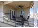 Covered patio with seating area and ceiling fan at 8183 W Raven Dr, Arizona City, AZ 85123