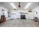 Garage with overhead storage and workbench at 8183 W Raven Dr, Arizona City, AZ 85123