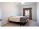 Bright bedroom with double bed and window at 8183 W Raven Dr, Arizona City, AZ 85123