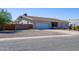 Charming single story home with a two car garage and gravel landscaping at 8183 W Raven Dr, Arizona City, AZ 85123