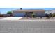 Ranch-style home with a single-car garage and well-maintained landscaping at 8183 W Raven Dr, Arizona City, AZ 85123