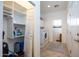 Laundry room with washer, dryer, and extra storage at 8183 W Raven Dr, Arizona City, AZ 85123