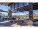 Relaxing outdoor lounge area with mountain views and comfortable seating at 27002 W Oraibi Dr, Buckeye, AZ 85396