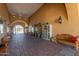 Covered walkway with tile floors and wooden benches at 2133 N Atwood --, Mesa, AZ 85207