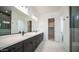 Modern bathroom with double vanity and a large walk-in shower at 6731 N 9Th Dr, Phoenix, AZ 85013