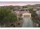 Single-story home with solar panels and landscaped yard at 15201 S 183Rd Dr, Goodyear, AZ 85338