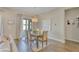 Bright dining room with seating for six and backyard access at 15201 S 183Rd Dr, Goodyear, AZ 85338