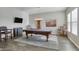 Game room boasts a pool table and seating area at 15201 S 183Rd Dr, Goodyear, AZ 85338