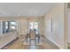 Open dining area with table and chairs, adjacent to living room and kitchen at 15201 S 183Rd Dr, Goodyear, AZ 85338