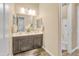 Clean bathroom with double vanity and a shower/tub combo at 15201 S 183Rd Dr, Goodyear, AZ 85338