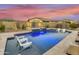 Stunning pool and spa with a waterfall feature at 15201 S 183Rd Dr, Goodyear, AZ 85338
