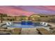 Inviting pool and spa with plenty of lounge seating at 15201 S 183Rd Dr, Goodyear, AZ 85338