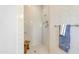 Clean shower with light gray subway tile and built-in shower seat at 15201 S 183Rd Dr, Goodyear, AZ 85338
