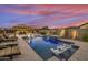 Stunning pool, spa, and pergola create a relaxing backyard retreat at 15201 S 183Rd Dr, Goodyear, AZ 85338