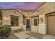 Tan house with a charming front entryway at 15201 S 183Rd Dr, Goodyear, AZ 85338