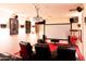 Home theater with projector, screen, and comfortable seating at 10648 E Greythorn Dr, Scottsdale, AZ 85262