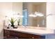 Bathroom with modern vanity, updated fixtures and large mirror at 10648 E Greythorn Dr, Scottsdale, AZ 85262