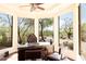 Home office with built-in desk and expansive window views at 10648 E Greythorn Dr, Scottsdale, AZ 85262