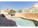 Relaxing pool area with waterfall feature at 10648 E Greythorn Dr, Scottsdale, AZ 85262
