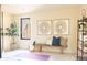 Relaxing yoga room with natural light and wooden bench at 10648 E Greythorn Dr, Scottsdale, AZ 85262