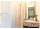 Bathroom with shower and mosaic tile vanity at 10648 E Greythorn Dr, Scottsdale, AZ 85262