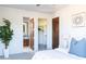Bedroom with ensuite bathroom and walk-in closet at 10648 E Greythorn Dr, Scottsdale, AZ 85262