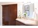 Bathroom with vanity, sink, and mirrored medicine cabinet at 10648 E Greythorn Dr, Scottsdale, AZ 85262