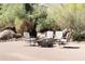 Relaxing patio with fire pit and comfortable seating at 10648 E Greythorn Dr, Scottsdale, AZ 85262
