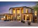 Elegant two-story home with beautiful desert landscaping at 10648 E Greythorn Dr, Scottsdale, AZ 85262
