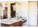 Elegant bathroom vanity with ample storage and modern fixtures at 10648 E Greythorn Dr, Scottsdale, AZ 85262