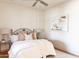 Cozy bedroom with metal bed frame and artwork at 10648 E Greythorn Dr, Scottsdale, AZ 85262
