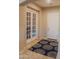 Bright and airy entryway with a view to the dining room at 27002 W Oraibi Dr, Buckeye, AZ 85396