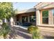 Covered patio, seating area, and gravel landscaping at 27002 W Oraibi Dr, Buckeye, AZ 85396