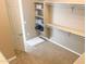 Spacious walk-in closet with ample shelving and hanging space at 27002 W Oraibi Dr, Buckeye, AZ 85396