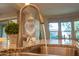 Modern kitchen sink and faucet with granite countertop at 27002 W Oraibi Dr, Buckeye, AZ 85396