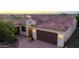 Single-story home with tile roof and a large backyard at 27002 W Oraibi Dr, Buckeye, AZ 85396
