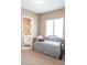 Bedroom with daybed and en-suite bathroom access at 27002 W Oraibi Dr, Buckeye, AZ 85396