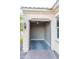 Spacious, empty garage with painted concrete floor at 27002 W Oraibi Dr, Buckeye, AZ 85396