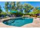 Beautiful pool and spa with ample seating and landscaping at 2544 E Denton Ln, Phoenix, AZ 85016