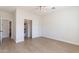 Bedroom with light wood floors, closet, and door at 3939 S Veronica Ln, Gold Canyon, AZ 85118